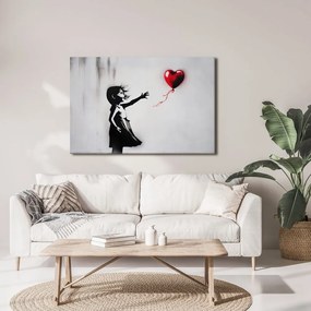 Quadro su tela – Ragazza e cuore volante