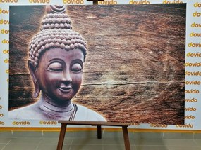 Stampa su tela – Statua del Buddha su sfondo di legno