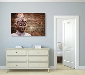 Stampa su tela – Statua del Buddha su sfondo di legno