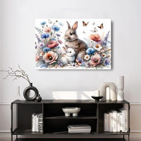 Quadro su tela – Coniglietti in giardino primaverile in fiore