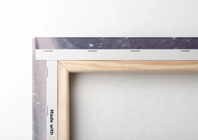 Quadro su tela – Cervo e caprioli nel villaggio innevato