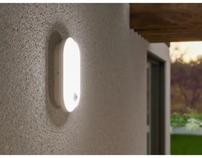 Lampada da parete LED per esterni con sensore OVAL LED/10W/230V IP65, bianco