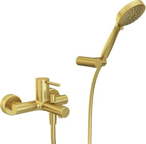 Rubinetto per vasca getto laminare cristallino TAYRONA per muro oro spazzolato HUBER