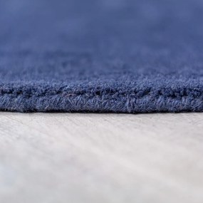 Tappeto rotondo blu in lana tessuto a mano ø 150 cm Mia Segment – Flair Rugs