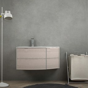 Mobile per bagno sospeso 60 cm Rovere sbiancato design curvo asimmetrico modello Rio con lavabo a sinistra