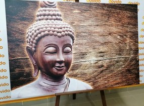 Stampa su tela – Statua del Buddha su sfondo di legno