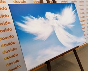 Quadro su tela – Figura d'angelo tra le nuvole