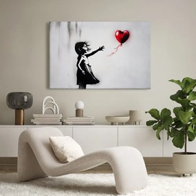Quadro su tela – Ragazza e cuore volante