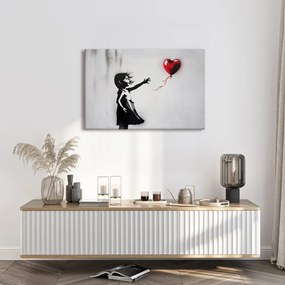 Quadro su tela – Ragazza e cuore volante