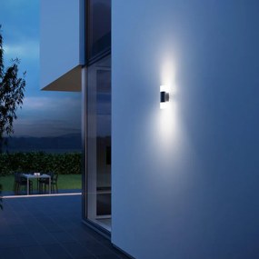 Applique LED moderno da esterno L 910 M grigio con sensore crepuscolare STEINEL IP44