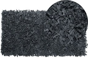Tappeto shaggy in pelle nera 80 x 150 cm MUT Beliani