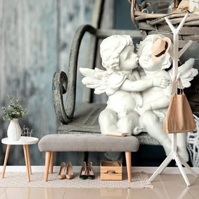Carta da parati autoadesiva – Statuette di angeli su panchina