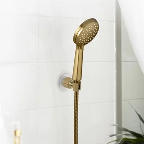 Supporto per soffione doccia senza foratura oro opaco in plastica Libertà – Wenko