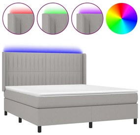 Letto a molle materasso e led grigio chiaro 160x200 cm tessuto