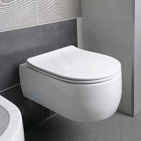 Copriwater Flo Slim a d originale per serie sanitari in resina bianco con chiusura rallentata su coperchio e ciambella