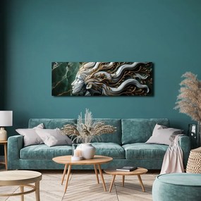 Quadro su tela – Donna unita alla natura con foglie dorate