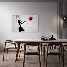 Quadro su tela – Ragazza e cuore volante