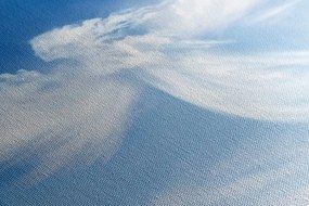Quadro su tela – Figura d'angelo tra le nuvole
