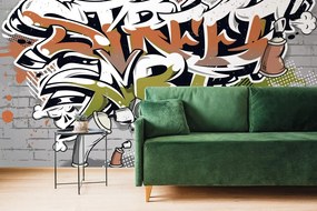 Carta da parati autoadesiva – Scritta Street Art arancione con spray