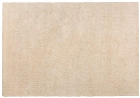 Tappeto shaggy beige chiaro 140 x 200 cm DEMRE Beliani