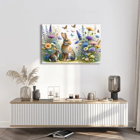 Quadro su tela – Coniglietti su prato fiorito di primavera