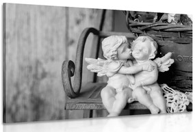 Quadro su tela – Statuette di angioletti sulla panchina in bianco e nero
