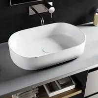 Lavabo da appoggio ovale in ceramica bianco lucido serie Infinity cm 55x36