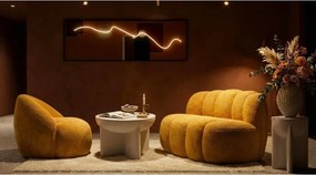 Poltrona color senape con rivestimento in bouclé Ginerva – Mauro Ferretti