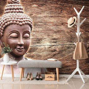 Carta da parati autoadesiva – Statua di Buddha su sfondo di legno