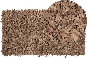 Tappeto shaggy in pelle beige 80 x 150 cm MUT Beliani