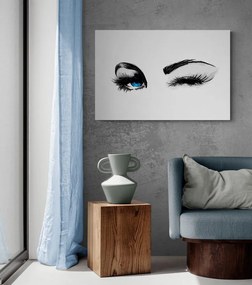 Quadro su tela – Occhi femminili che fanno l'occhiolino