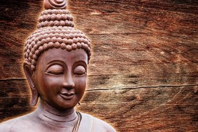 Stampa su tela – Statua del Buddha su sfondo di legno