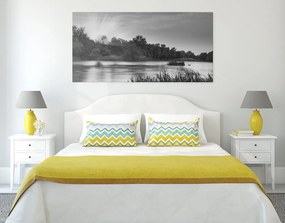 Quadro su tela – Alba sul fiume in bianco e nero