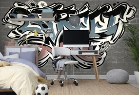 Carta da parati – Imitazione mattoni con scritta Street Art