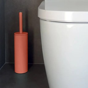Portascopino d'appoggio in acciaio color terracotta opaco con scopino in setole nere removibile Axin