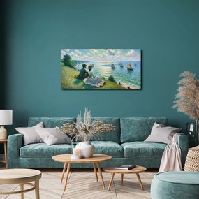 Quadro su tela – Coppia che osserva la barca a vela