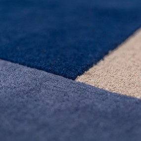 Tappeto rotondo blu in lana tessuto a mano ø 150 cm Mia Segment – Flair Rugs