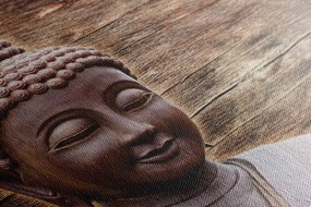 Stampa su tela – Statua del Buddha su sfondo di legno