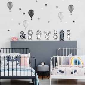 Adesivi in bianco e nero di animaletti con palloncini nello stile nordico | Inspio