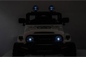Macchina Elettrica per Bambini Fuoristrada Toyota Fj Cruiser 12V Telecomando Ruote in Gomma e Sedile in Pelle Bianco...