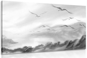 Quadro su tela – Volo di uccelli sopra il paesaggio in bianco e nero
